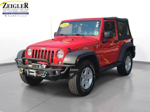 Red 2017 Jeep Wrangler Sport for sale in Grandville, MI