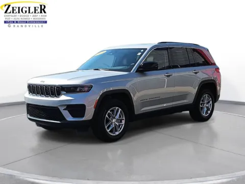 Silver 2023 Jeep Grand Cherokee Laredo for sale in Grandville, MI