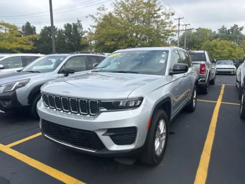 Silver 2023 Jeep Grand Cherokee Laredo for sale in Grandville, MI
