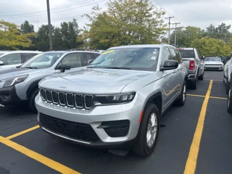 Silver 2023 Jeep Grand Cherokee Laredo for sale in Grandville, MI