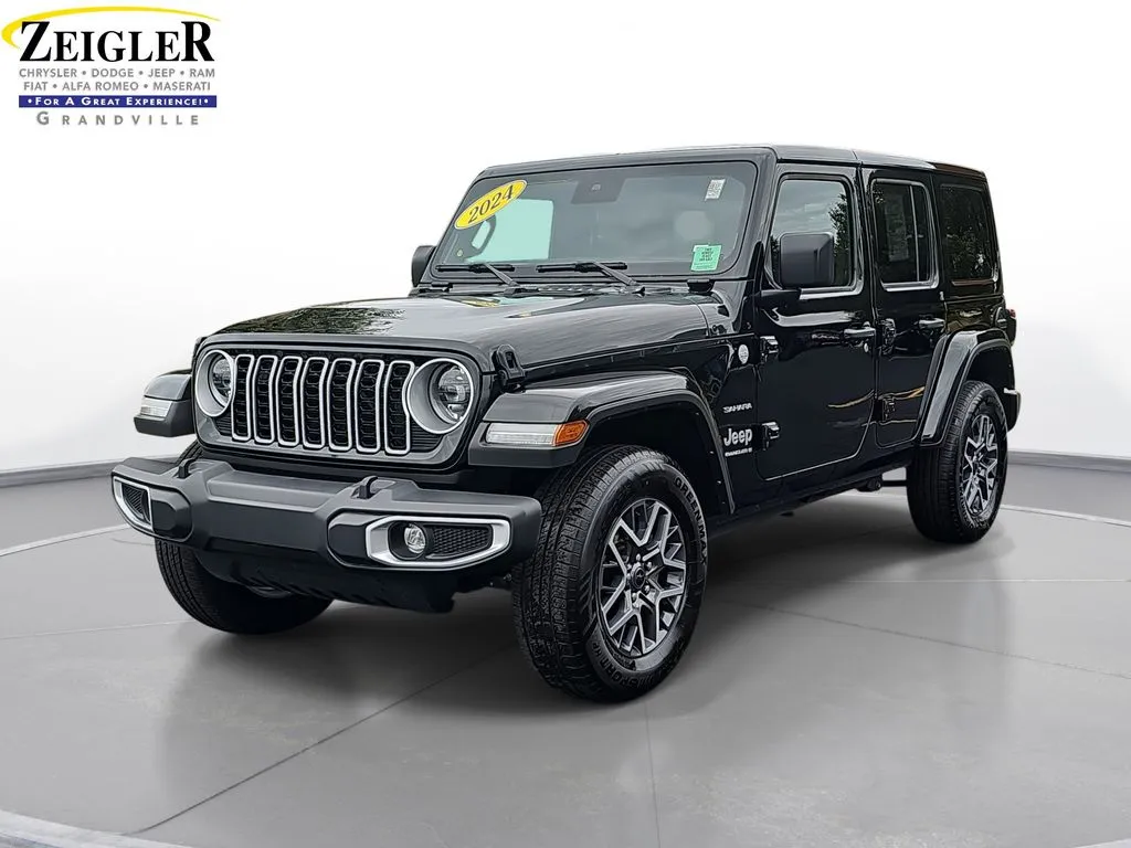 Black 2024 Jeep Wrangler Sahara for sale in Grandville, MI