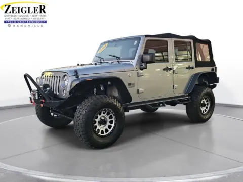 Silver 2018 Jeep Wrangler JK Unlimited Sport for sale in Grandville, MI