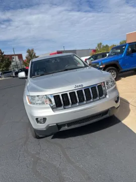 Silver 2011 Jeep Grand Cherokee Laredo for sale in Grandville, MI