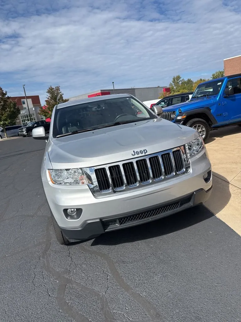 Silver 2011 Jeep Grand Cherokee Laredo for sale in Grandville, MI