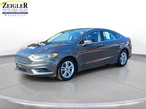 Gray 2018 Ford Fusion SE for sale in Grandville, MI