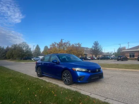 Blue 2023 Honda Civic EX for sale in Grandville, MI