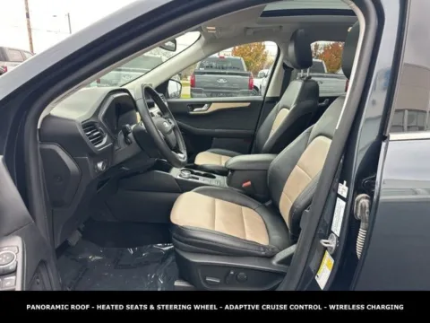 Photos of 2022 Ford Escape Hybrid Titanium for sale in Lowell, MI at Zeigler Ford of Lowell