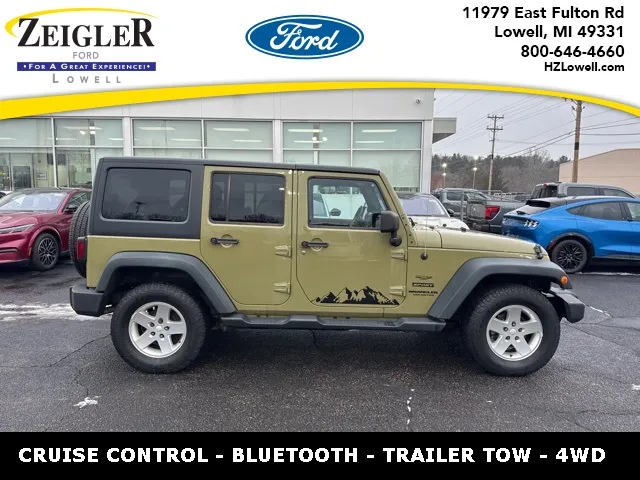 Green 2013 Jeep Wrangler Unlimited Sport for sale in Lowell, MI