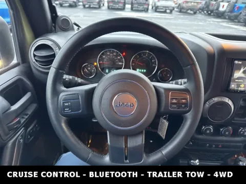 Photos of 2013 Jeep Wrangler Unlimited Sport for sale in Lowell, MI at Zeigler Ford of Lowell