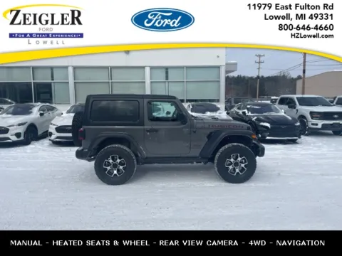 Gray 2023 Jeep Wrangler Rubicon for sale in Lowell, MI
