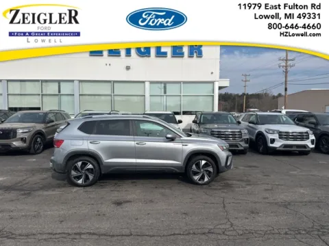 Silver 2023 Volkswagen Taos 1.5T SE for sale in Lowell, MI