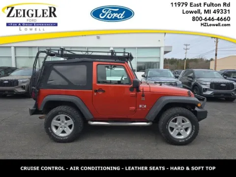 Orange 2009 Jeep Wrangler X for sale in Lowell, MI