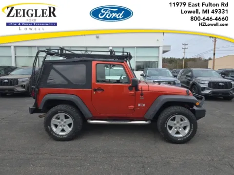 Orange 2009 Jeep Wrangler X for sale in Lowell, MI