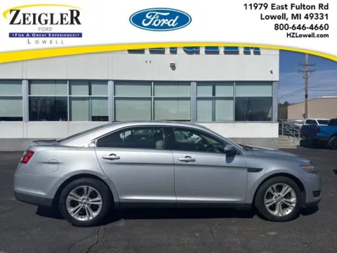 Silver 2013 Ford Taurus SEL for sale in Lowell, MI
