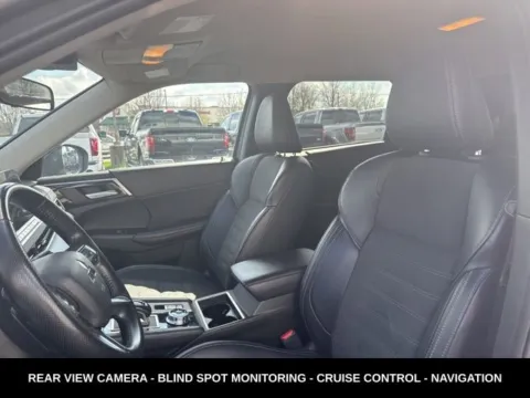 Photos of 2024 Mitsubishi Outlander SE for sale in Lowell, MI at Zeigler Ford of Lowell