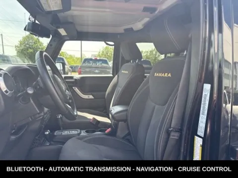 Photos of 2015 Jeep Wrangler Unlimited Sahara for sale in Lowell, MI at Zeigler Ford of Lowell