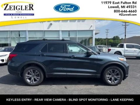 Blue 2024 Ford Explorer XLT for sale in Lowell, MI