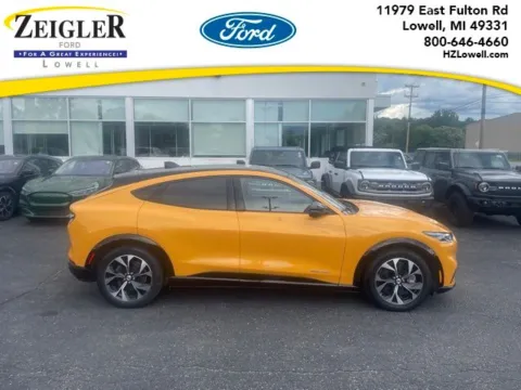 Orange 2023 Ford Mustang Mach-E Premium for sale in Lowell, MI