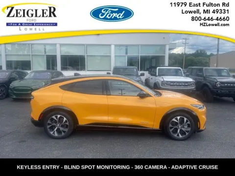Orange 2023 Ford Mustang Mach-E Premium for sale in Lowell, MI