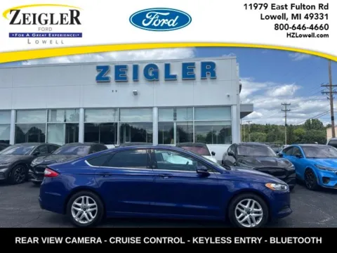 Blue 2016 Ford Fusion SE for sale in Lowell, MI