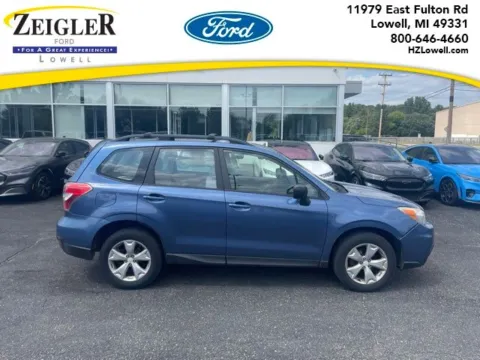 Blue 2015 Subaru Forester 2.5i for sale in Lowell, MI