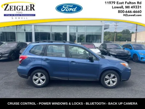 Blue 2015 Subaru Forester 2.5i for sale in Lowell, MI