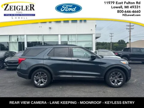 Blue 2023 Ford Explorer XLT for sale in Lowell, MI