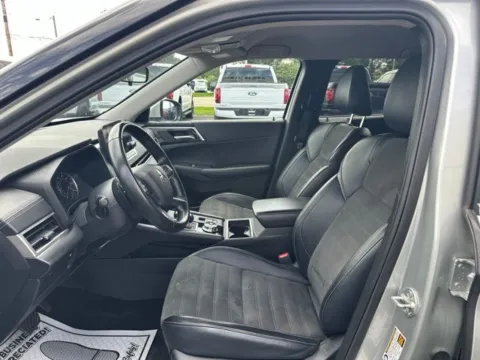 Photos of 2024 Mitsubishi Outlander SE for sale in Lowell, MI at Zeigler Ford of Lowell