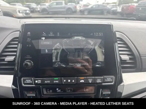 Photos of 2023 Honda Odyssey Touring for sale in Lowell, MI at Zeigler Ford of Lowell