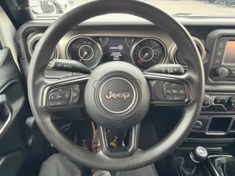 Photos of 2021 Jeep Wrangler Sport for sale in Lowell, MI at Zeigler Ford of Lowell
