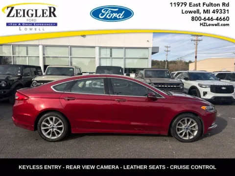 Red 2017 Ford Fusion SE for sale in Lowell, MI