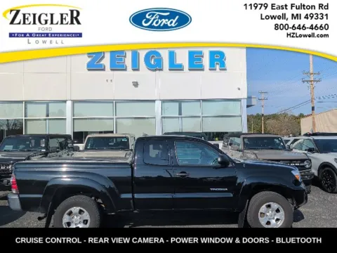 Black 2014 Toyota Tacoma for sale in Lowell, MI