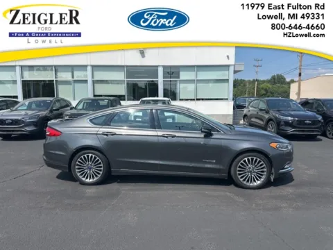 Gray 2017 Ford Fusion Hybrid Titanium for sale in Lowell, MI