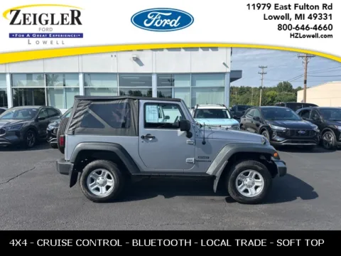 Silver 2013 Jeep Wrangler Sport for sale in Lowell, MI