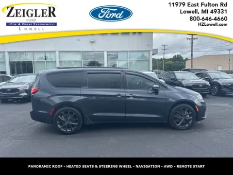 Blue 2021 Chrysler Pacifica Touring L for sale in Lowell, MI