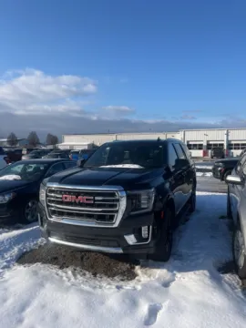 Black 2022 GMC Yukon SLT for sale in Holland, MI
