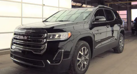 Black 2023 GMC Acadia SLE for sale in Holland, MI
