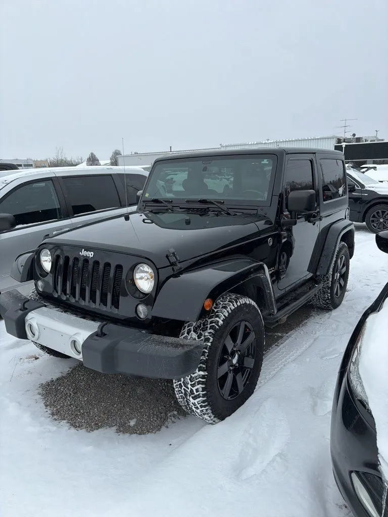 Black 2015 Jeep Wrangler Sahara for sale in Holland, MI