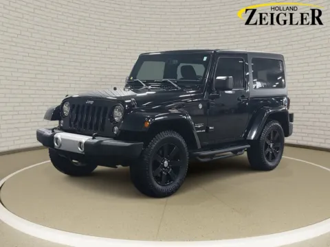 Black 2015 Jeep Wrangler Sahara for sale in Holland, MI