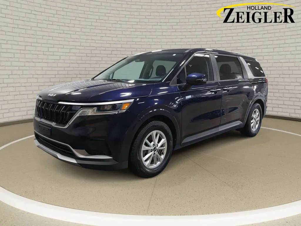 Blue 2023 Kia Carnival LX for sale in Holland, MI