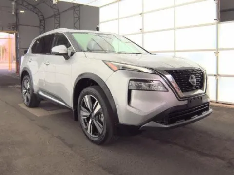 Silver 2023 Nissan Rogue SL for sale in Holland, MI