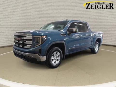 Blue 2024 GMC Sierra 1500 SLE for sale in Holland, MI