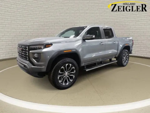 Gray 2024 GMC Canyon Denali for sale in Holland, MI