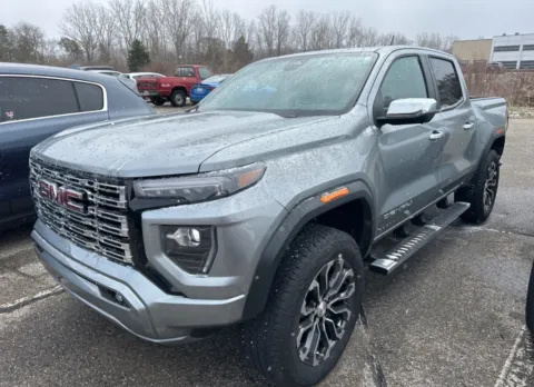 Gray 2024 GMC Canyon Denali for sale in Holland, MI