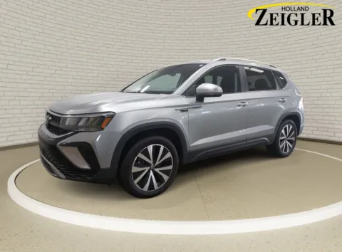 Silver 2023 Volkswagen Taos 1.5T SE for sale in Holland, MI