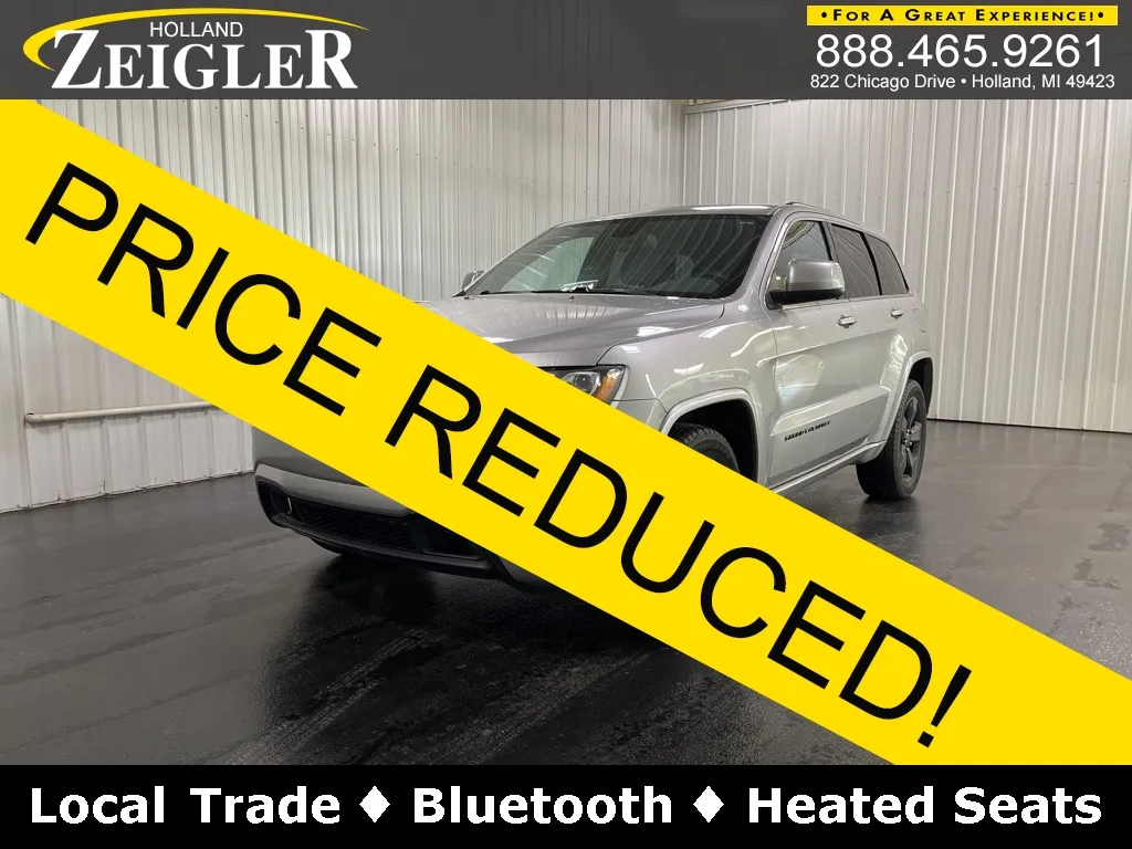 Silver 2015 Jeep Grand Cherokee Altitude for sale in Holland, MI