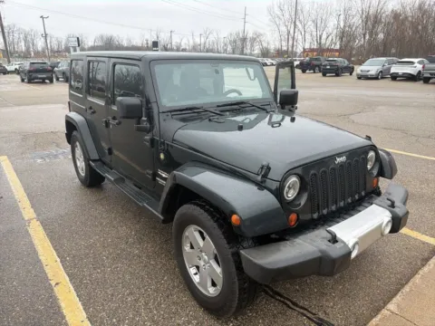 Photos of 2012 Jeep Wrangler Unlimited Sahara for sale in Holland, MI at Zeigler GMC of Holland
