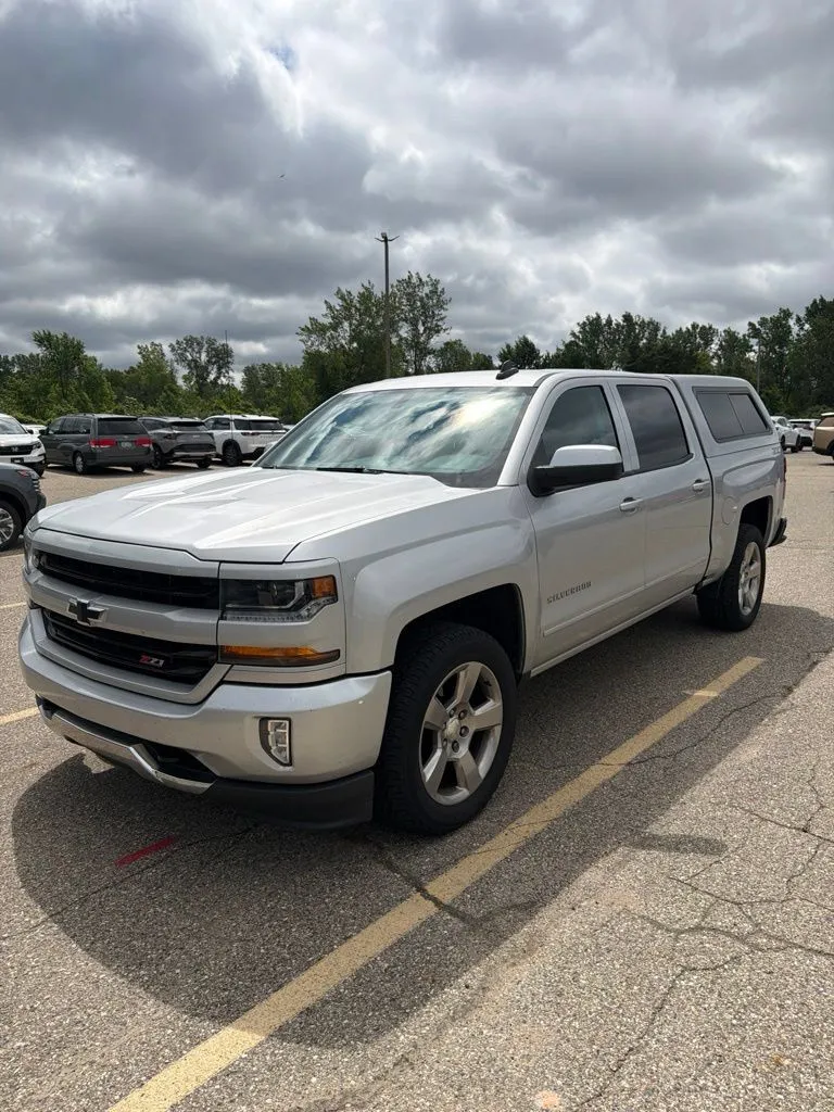 Silver 2018 Chevrolet Silverado 1500 LT for sale in Holland, MI