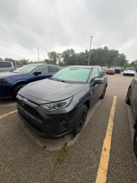Gray 2021 Toyota RAV4 Hybrid XLE for sale in Holland, MI