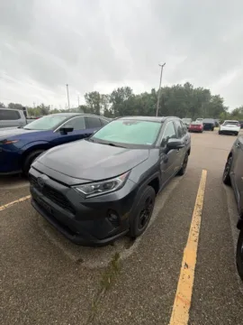 Gray 2021 Toyota RAV4 Hybrid XLE for sale in Holland, MI